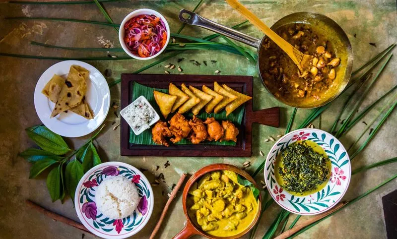 a variety of zanzibar dishes placed on a table